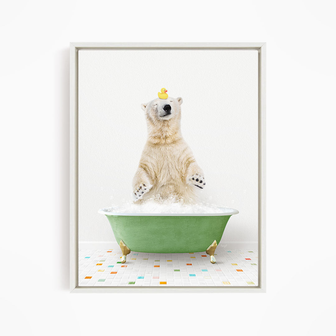 A polar bear standing in a green bathtub filled with bubbles, with a rubber duck perched on its head.