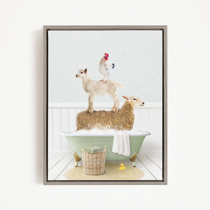 A framed image depicting a sheep standing on a goat's back while a rooster stands on the goat's head, all in a bathtub.