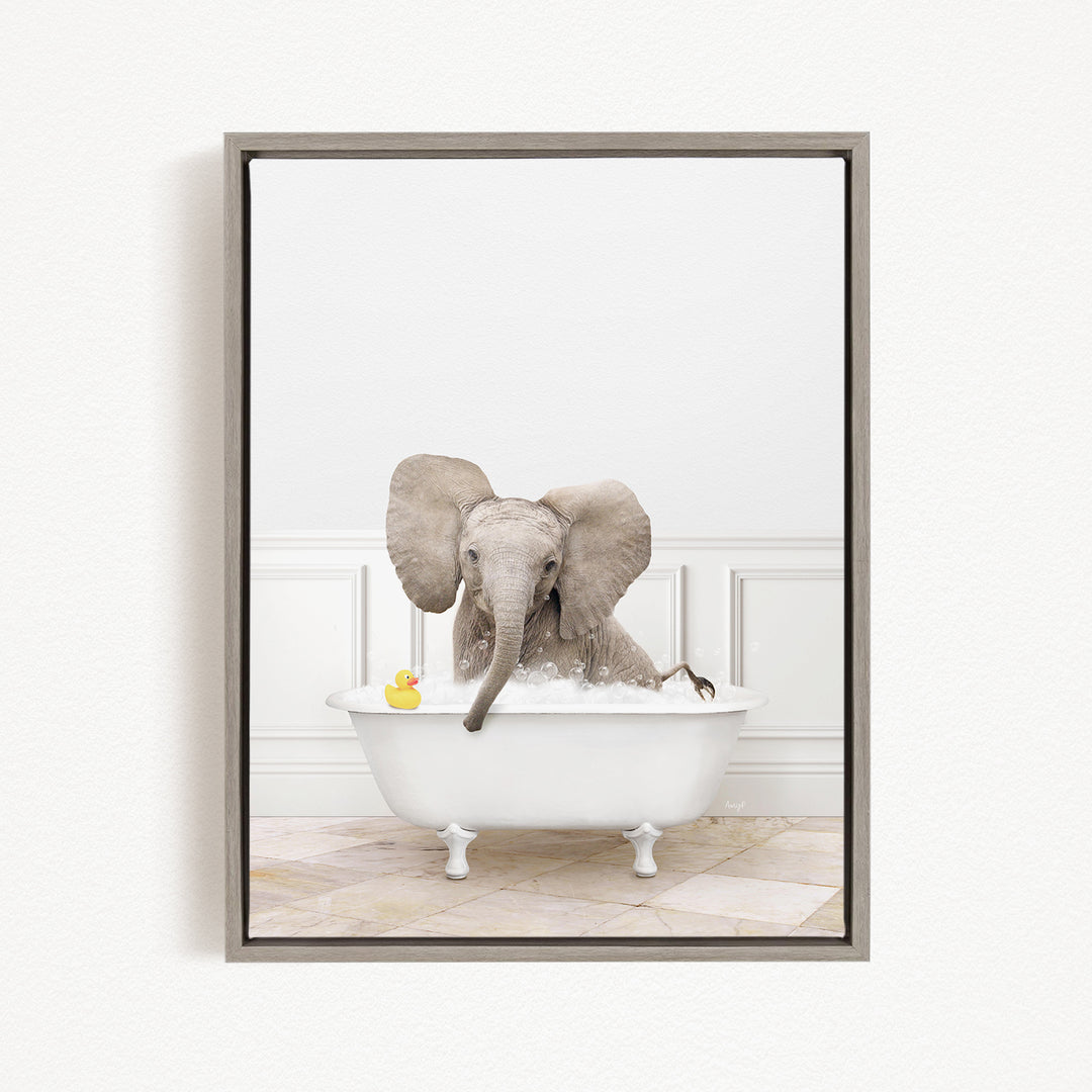 A gray elephant is sitting in a white bathtub, surrounded by a yellow rubber duck.