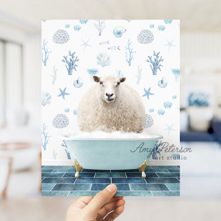 a hand holding a card with a sheep in a bathtub