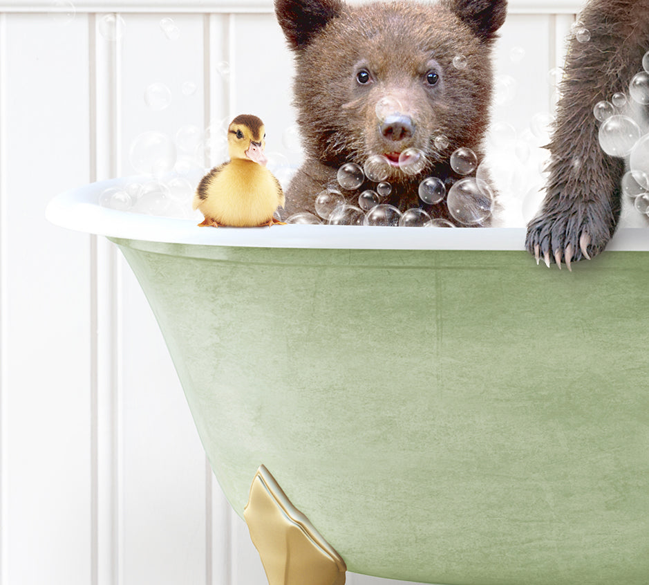 a bear and a rubber duck in a bathtub