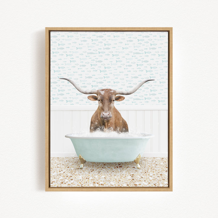 A brown bull with long horns is sitting in a light blue bathtub filled with water, creating a whimsical and playful scene.