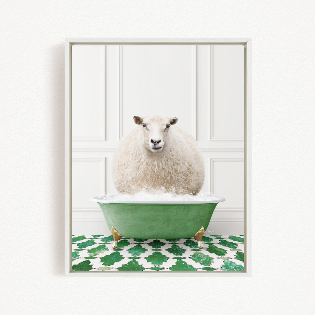 A fluffy white sheep sits in a green bathtub filled with bubbles, surrounded by a green and white patterned rug.