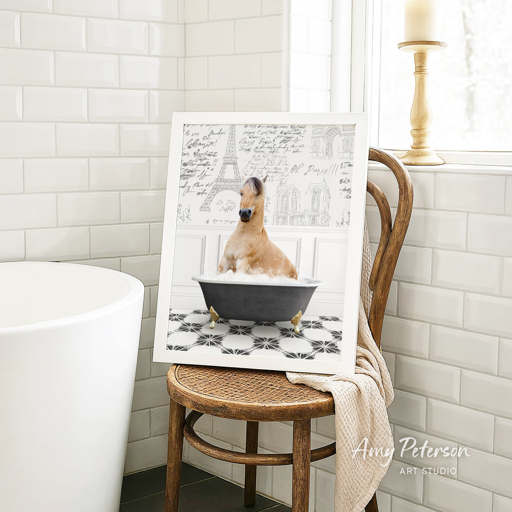 A framed image of a dog sitting in a bathtub, surrounded by a tiled bathroom setting.