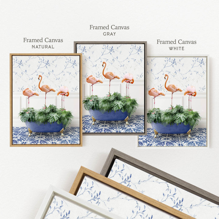 three framed pictures of pink flamingos in a blue and white floral arrangement, each with a different frame color: natural, gray, and white.