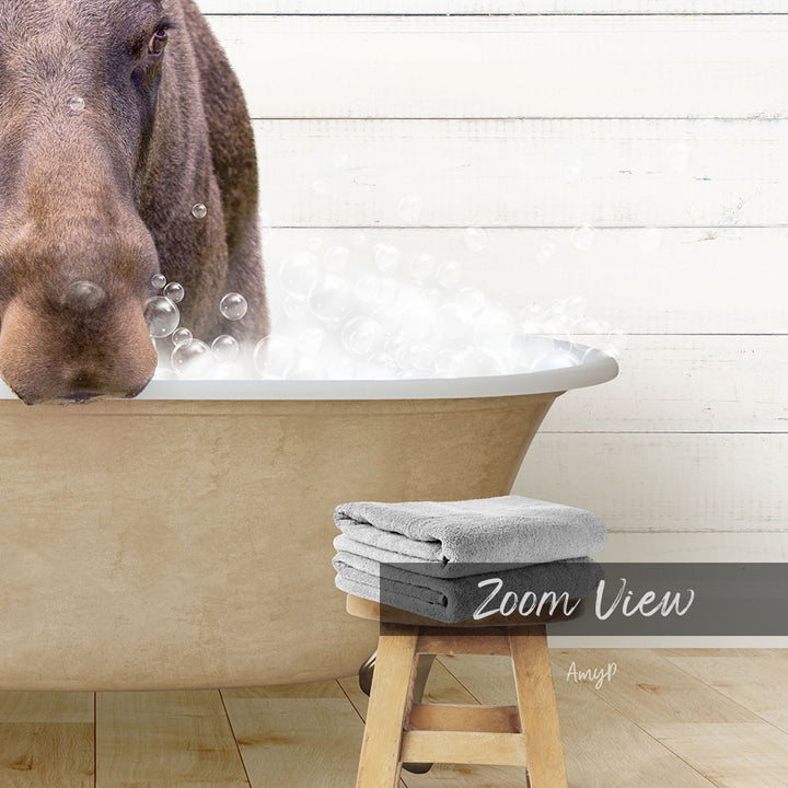 A close-up of a horse's head peeking over the edge of a bathtub filled with bubbles, with a towel and stool visible in the foreground.