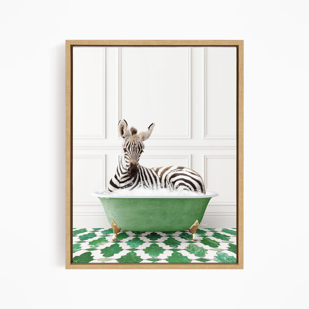 A zebra is sitting in a green bathtub, surrounded by a patterned green and white floor.