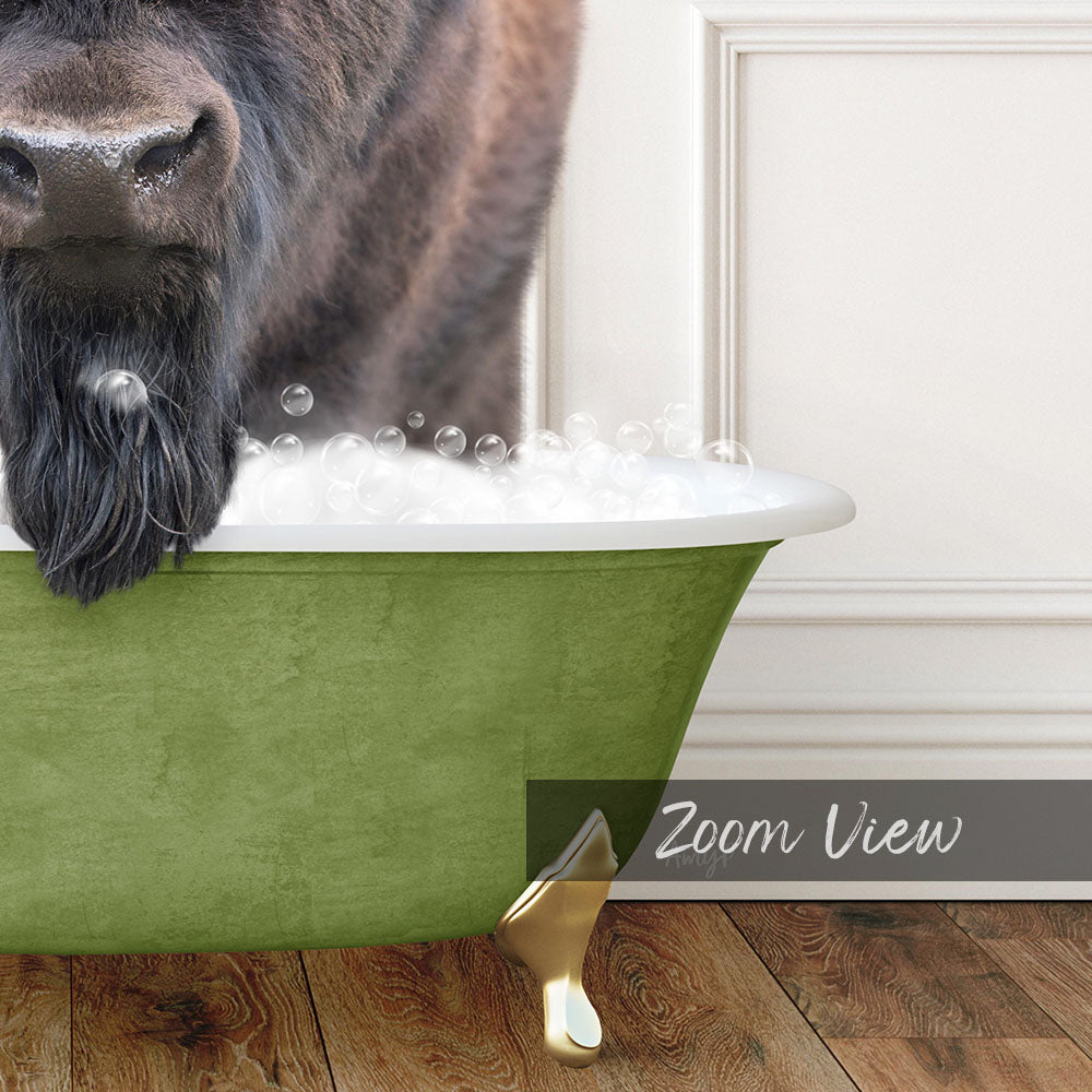 A close-up of a dog's face peeking over the edge of a green bathtub filled with bubbles, with a wooden floor and a white door visible in the background.