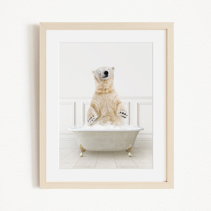 A polar bear standing in a white bathtub filled with water, appearing to be enjoying a bath.