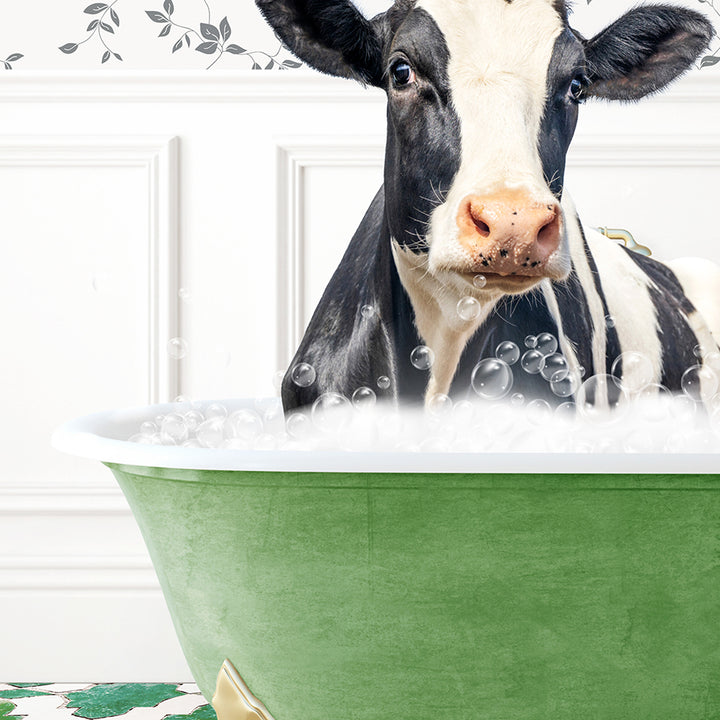 a black and white cow in a green bath tub