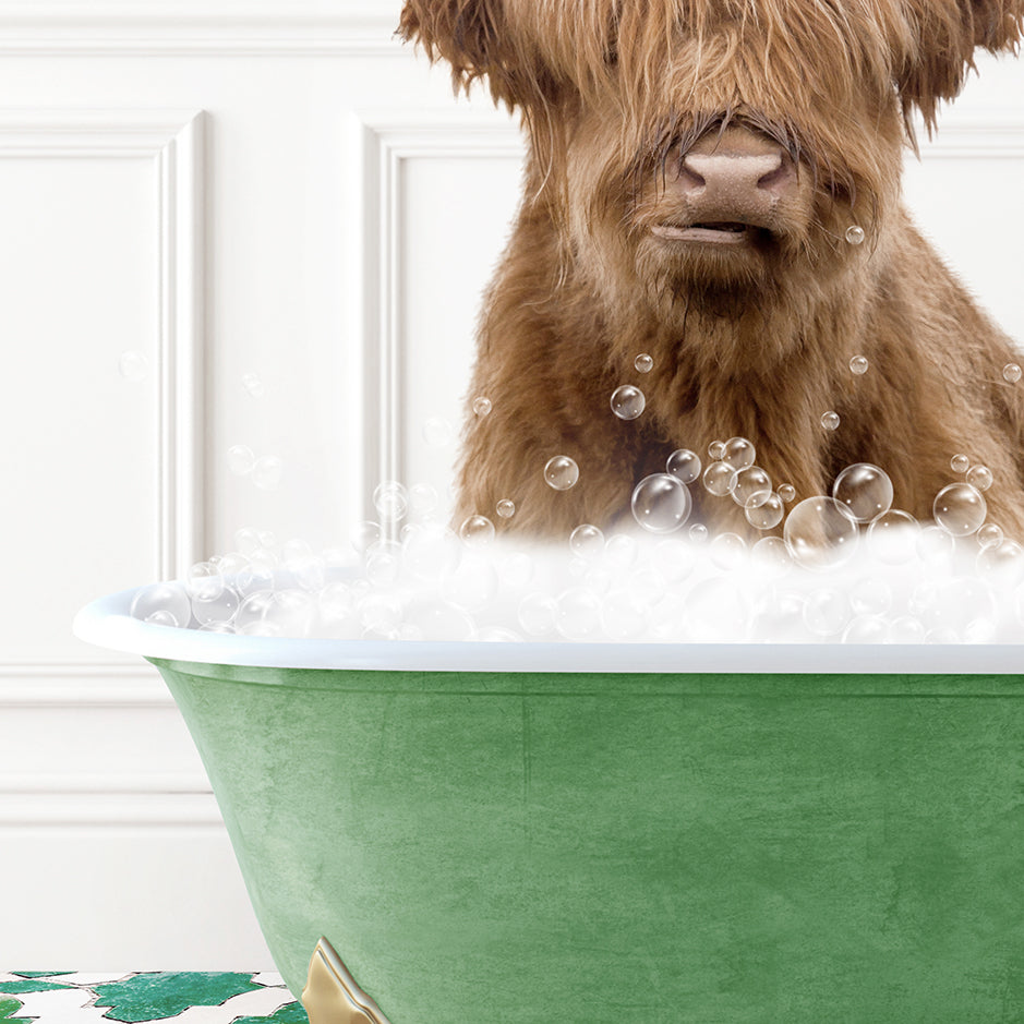 a brown dog sitting in a bath tub filled with bubbles