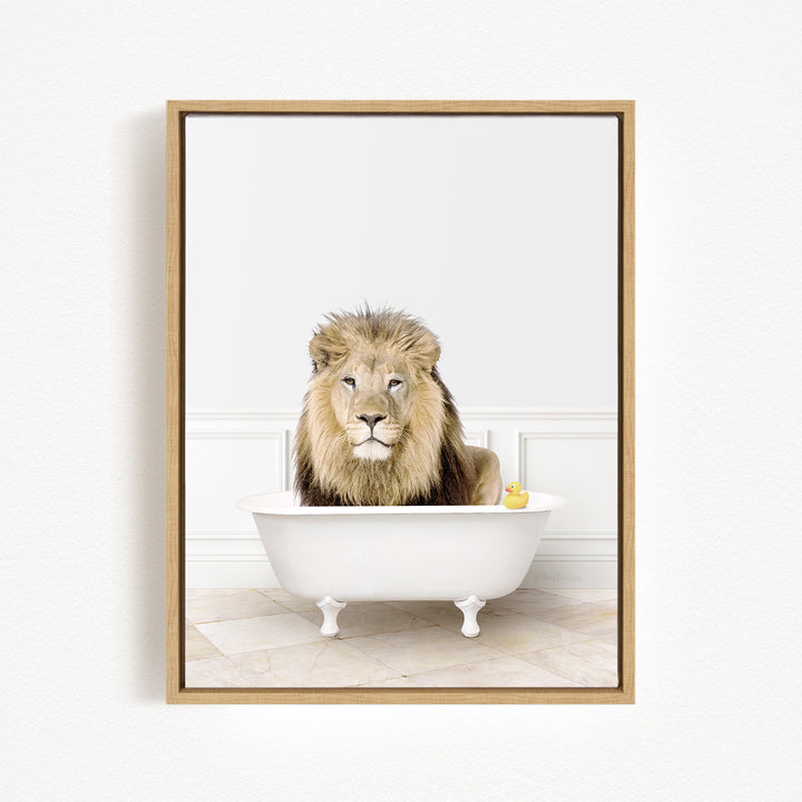 A lion sitting in a white bathtub, with a yellow rubber duck floating in the water.