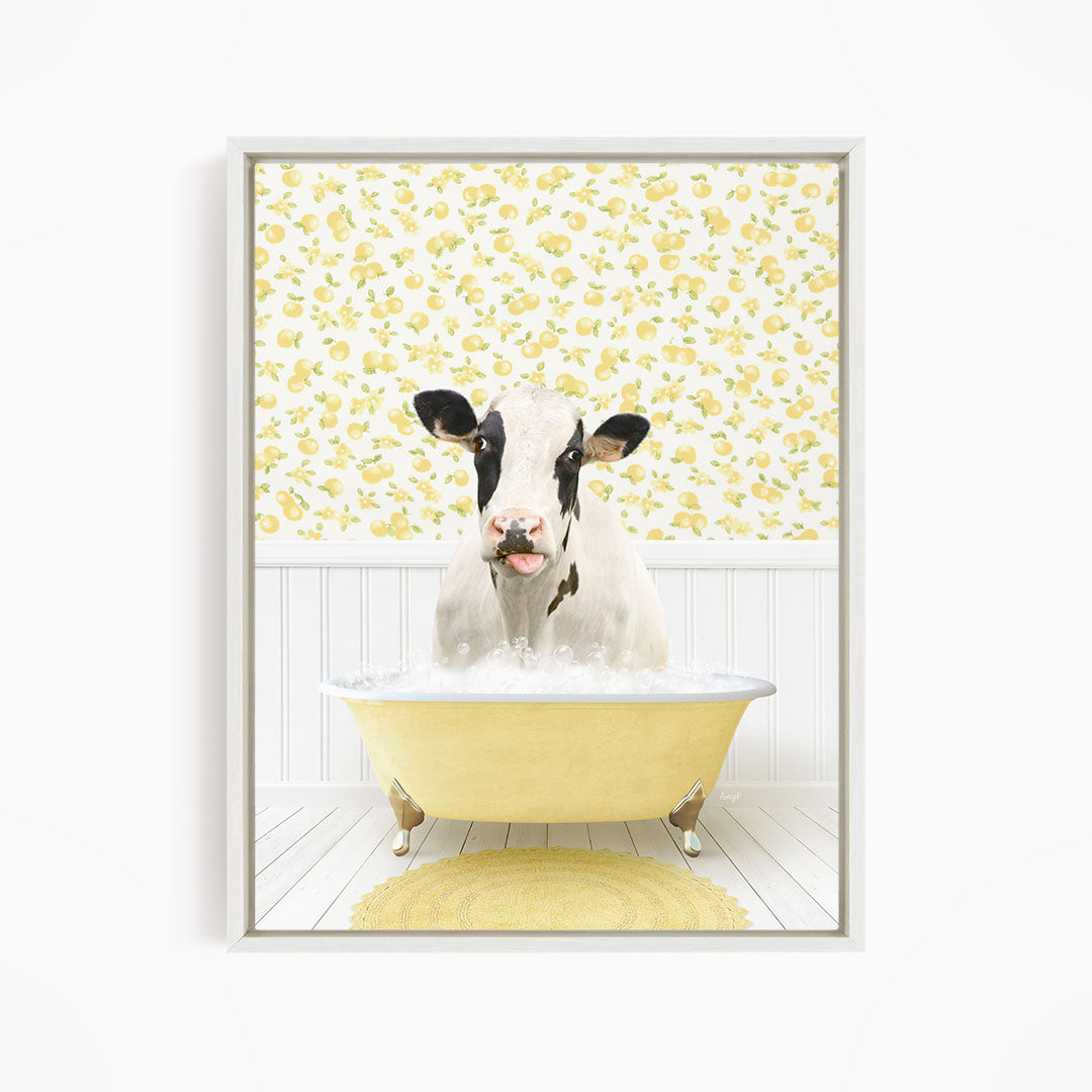 A black and white cow is sitting in a yellow bathtub filled with water, surrounded by a yellow floral pattern on the wall behind it.