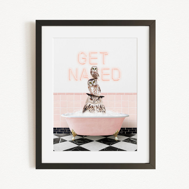 A framed image depicting a pink bathtub filled with water, with three owls sitting inside and the text "GET NAUGED" displayed above them.