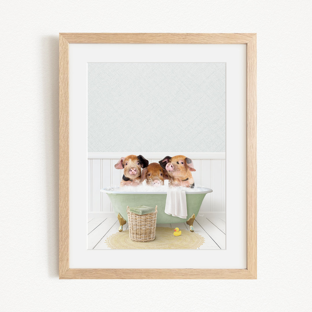 Three adorable pigs sitting in a green bathtub, enjoying a relaxing bath together.