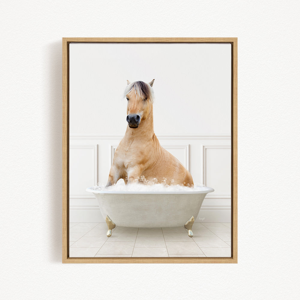 A light brown horse is sitting in a white bathtub filled with bubbles, creating a whimsical and playful scene.