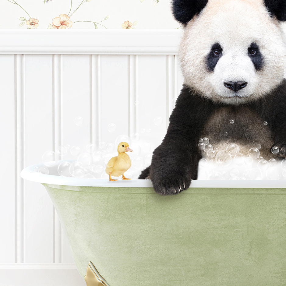 a panda bear sitting in a bathtub with bubbles