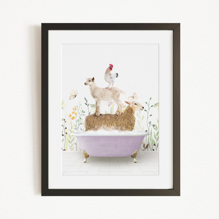 A framed image depicting a sheep standing on a bathtub, with a rooster perched on top, and a lamb sitting on the tub's edge.