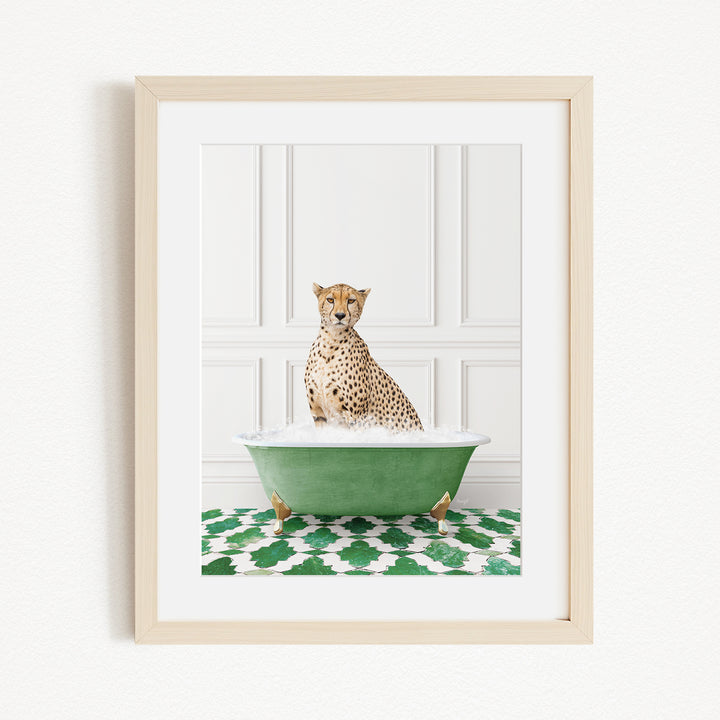A cheetah sitting in a green bathtub filled with water, surrounded by a green and white patterned rug.