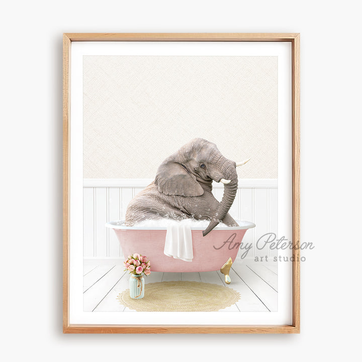 a picture of an elephant sitting in a bathtub