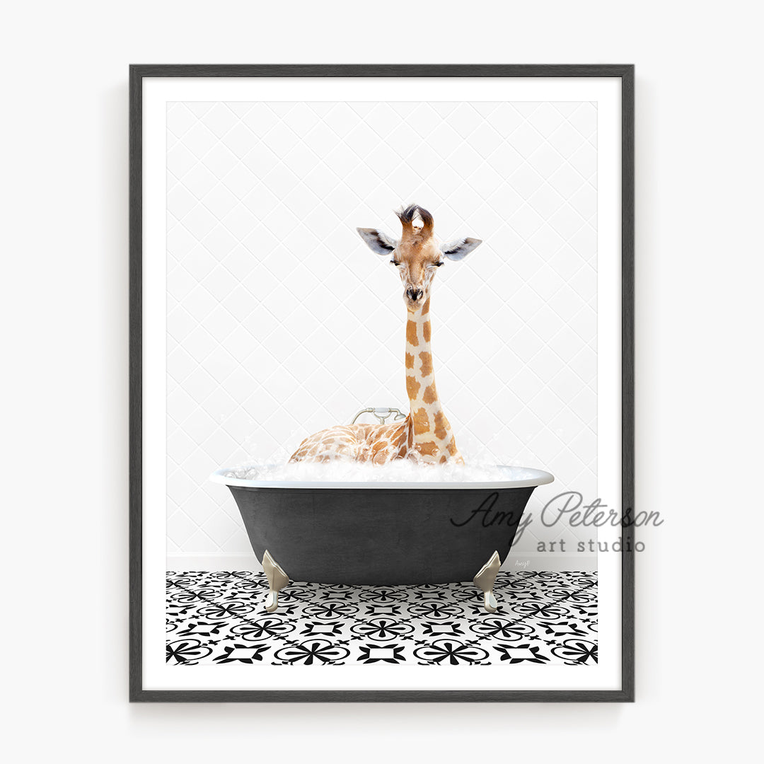 a giraffe is sitting in a bathtub