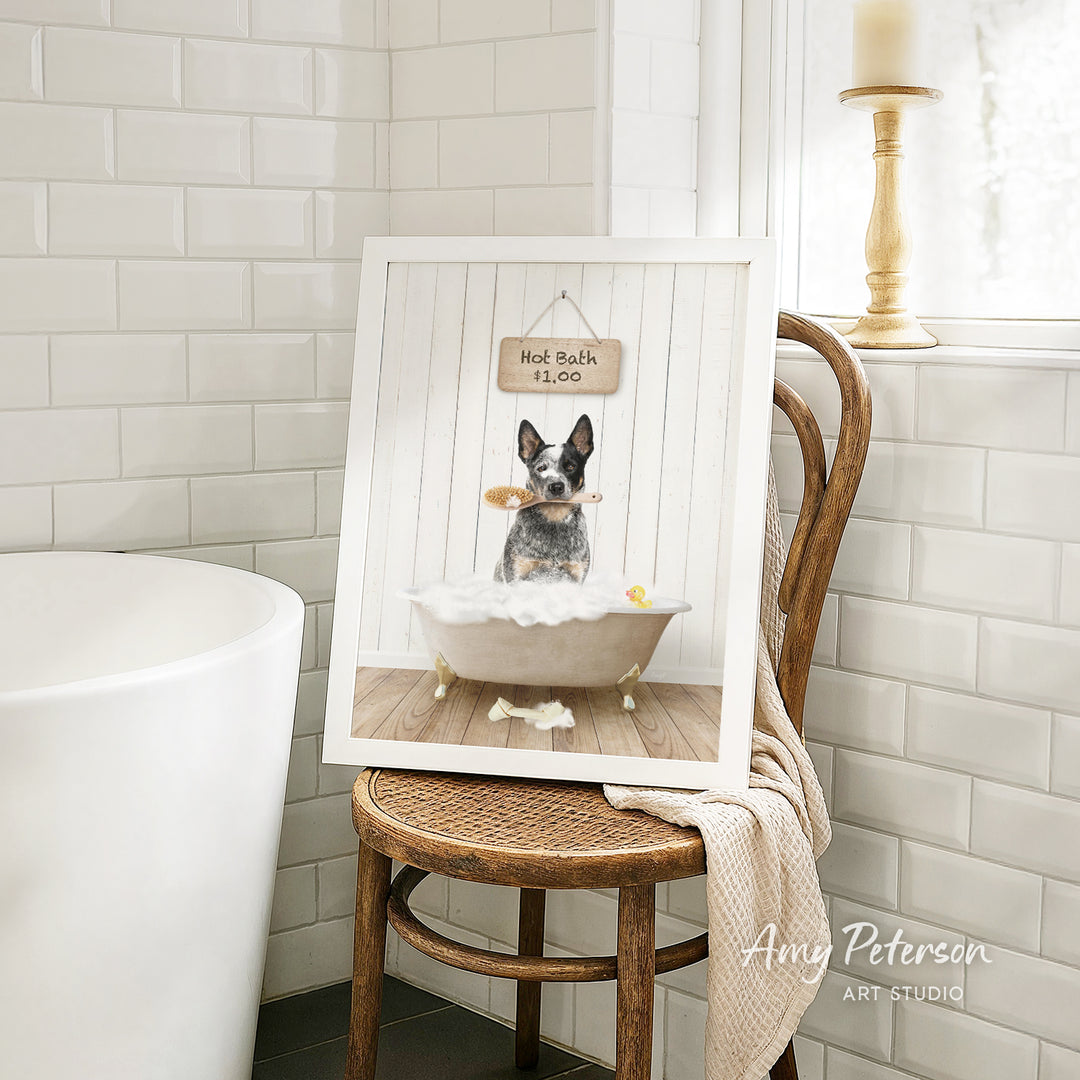 A framed image of a dog sitting in a bathtub, with a sign above it that says "Hot Bath $1.00".