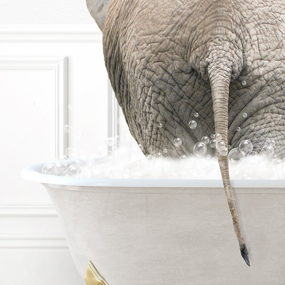 an elephant is taking a bath in a bathtub