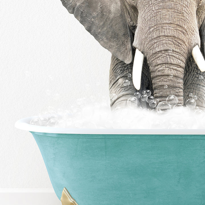 an elephant is taking a bath in a bathtub