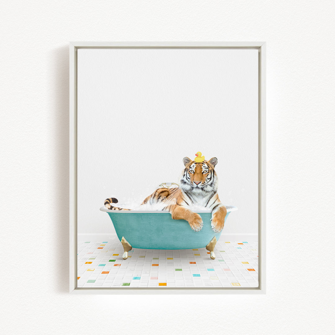 A tiger is sitting in a blue bathtub, wearing a yellow crown, and looking directly at the camera.