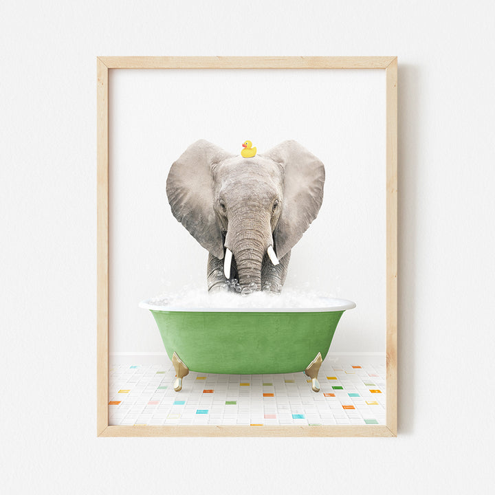 an elephant taking a bath in a green bathtub