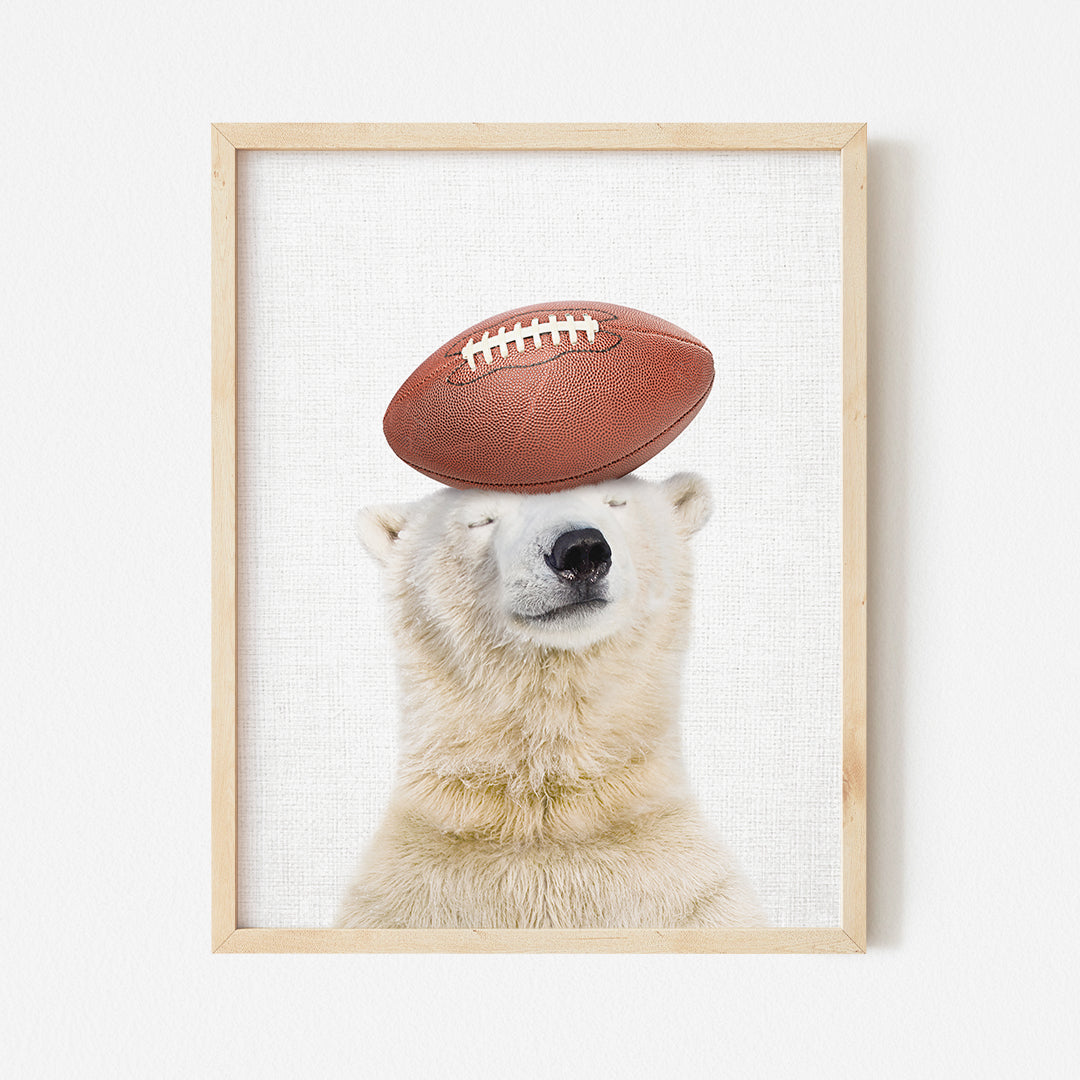 a polar bear with a football on its head