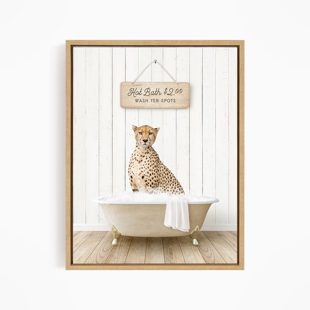 A cheetah sitting in a bathtub, with a wooden sign above it that reads "Hot Bath $2.00 WASH YER SPOTS".