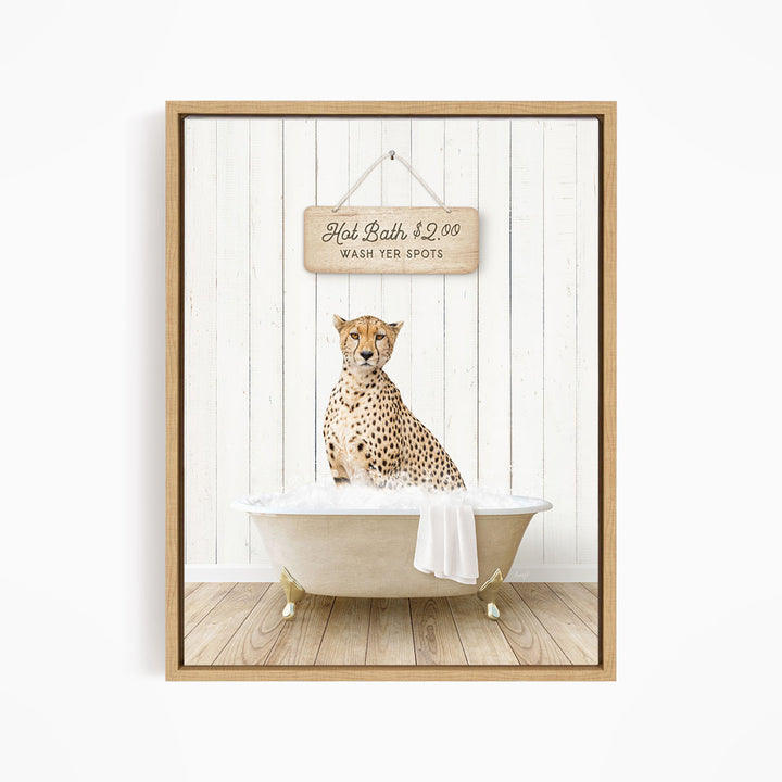 A cheetah sitting in a bathtub, with a wooden sign above it that reads "Hot Bath $2.00 WASH YER SPOTS".