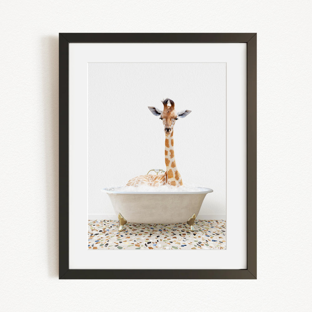 A giraffe is sitting in a white bathtub filled with water, creating a whimsical and playful scene.