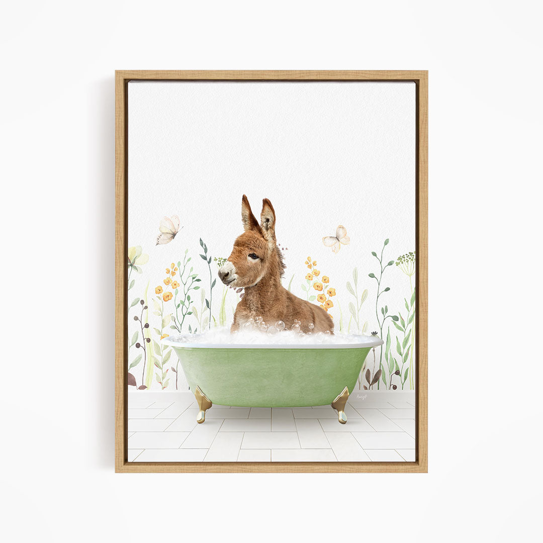 A donkey is sitting in a green bathtub filled with bubbles, surrounded by flowers and butterflies.