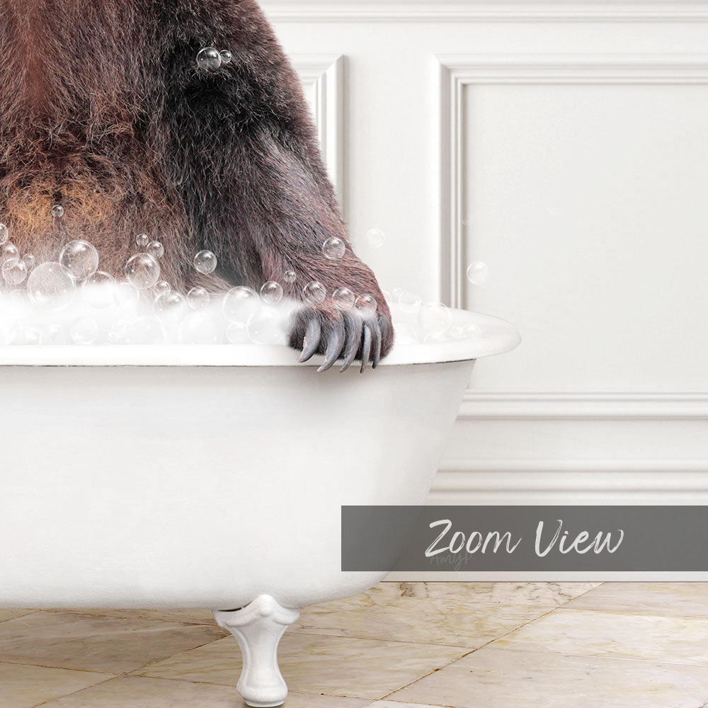 A close-up of a bear's paw in a white bathtub filled with bubbles, with the text "Zoom View" below the image.