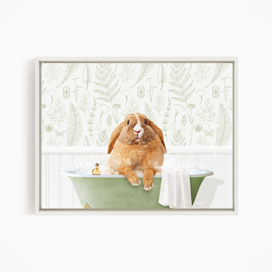 A brown rabbit sitting in a green bathtub filled with water, surrounded by a patterned wallpaper.
