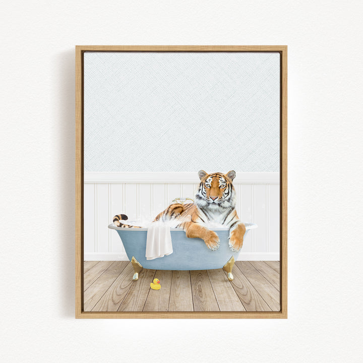 A tiger is sitting in a bathtub filled with water, surrounded by rubber ducks.