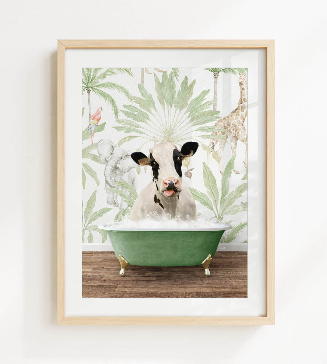 A framed image depicting a cow sitting in a green bathtub, surrounded by tropical foliage and animals.