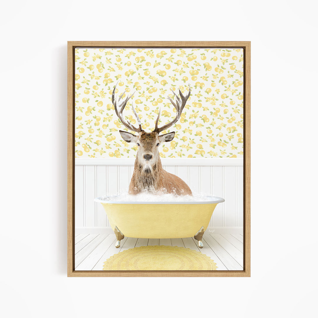 A deer with large antlers is sitting in a yellow bathtub filled with water, surrounded by a yellow floral pattern on the wall behind it.