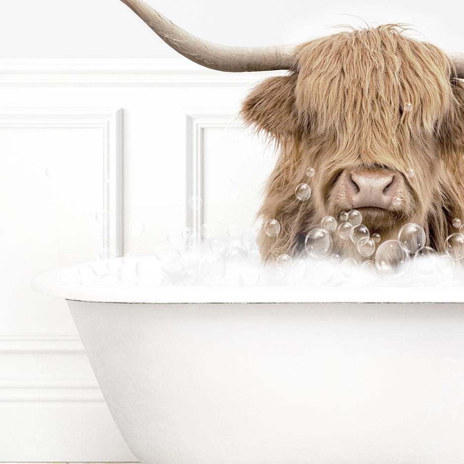 a bull with long horns is sitting in a bathtub