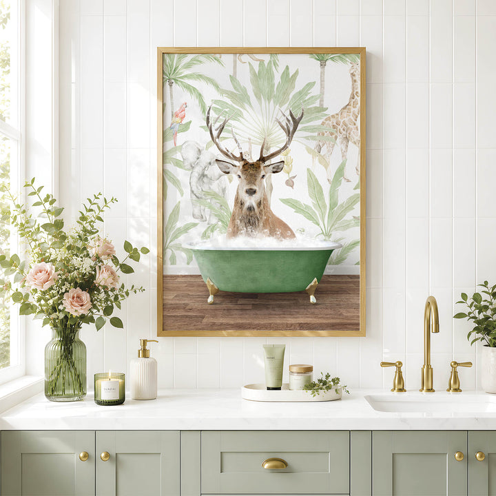a bathroom with a framed picture of a deer in a bathtub, surrounded by tropical foliage. The bathroom has a white countertop, a green faucet, and a vase of flowers.