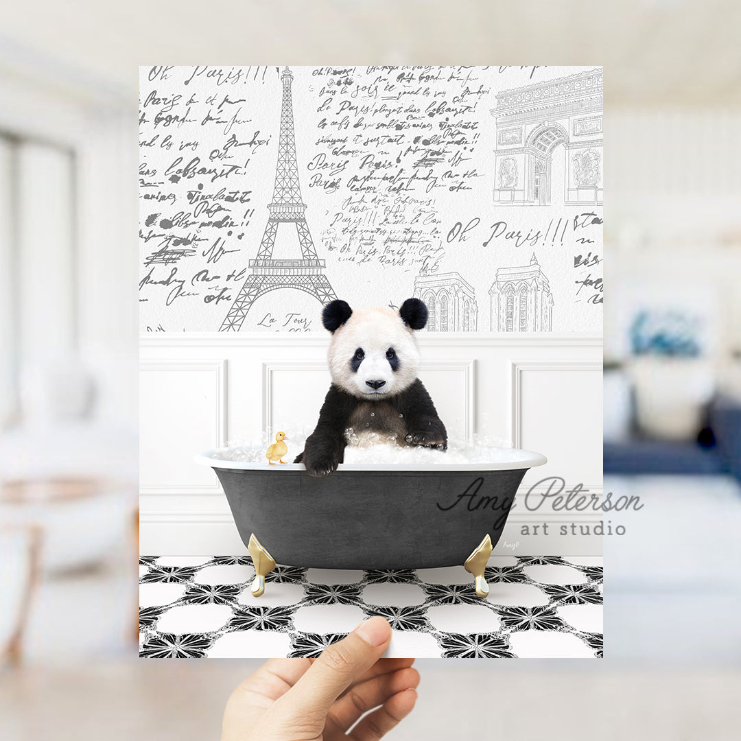 a person holding up a card with a panda bear in a bathtub