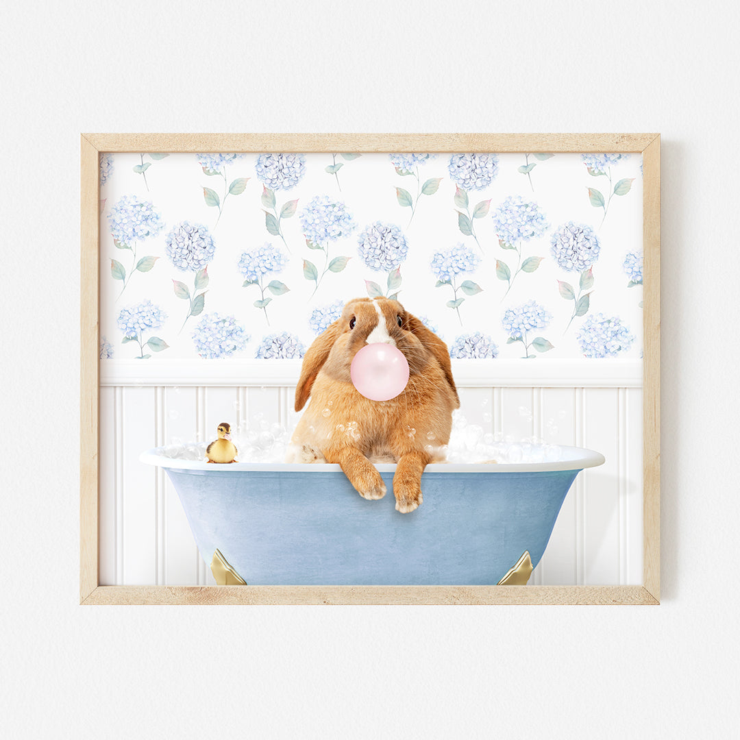 a rabbit in a bathtub with a bubble in it's mouth