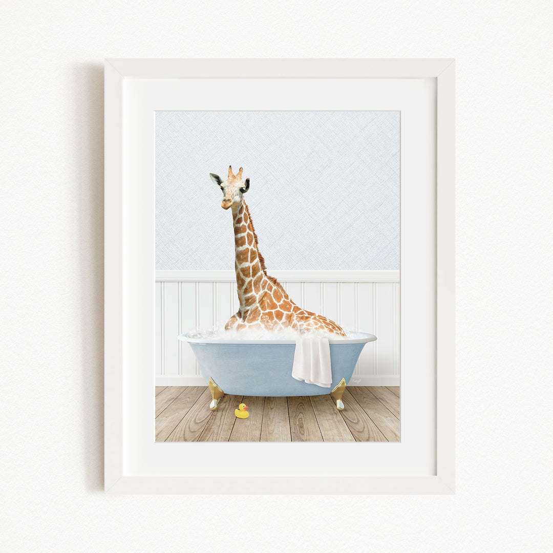 A giraffe sitting in a blue bathtub filled with water, surrounded by yellow rubber duckies.