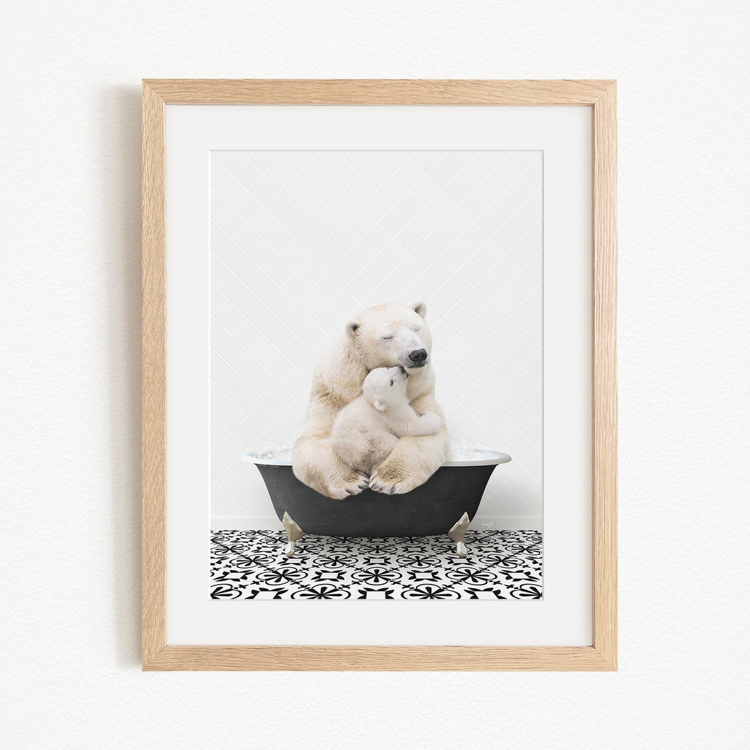 A mother polar bear tenderly embracing her cub in a black bathtub, set against a white background with a black and white patterned floor.