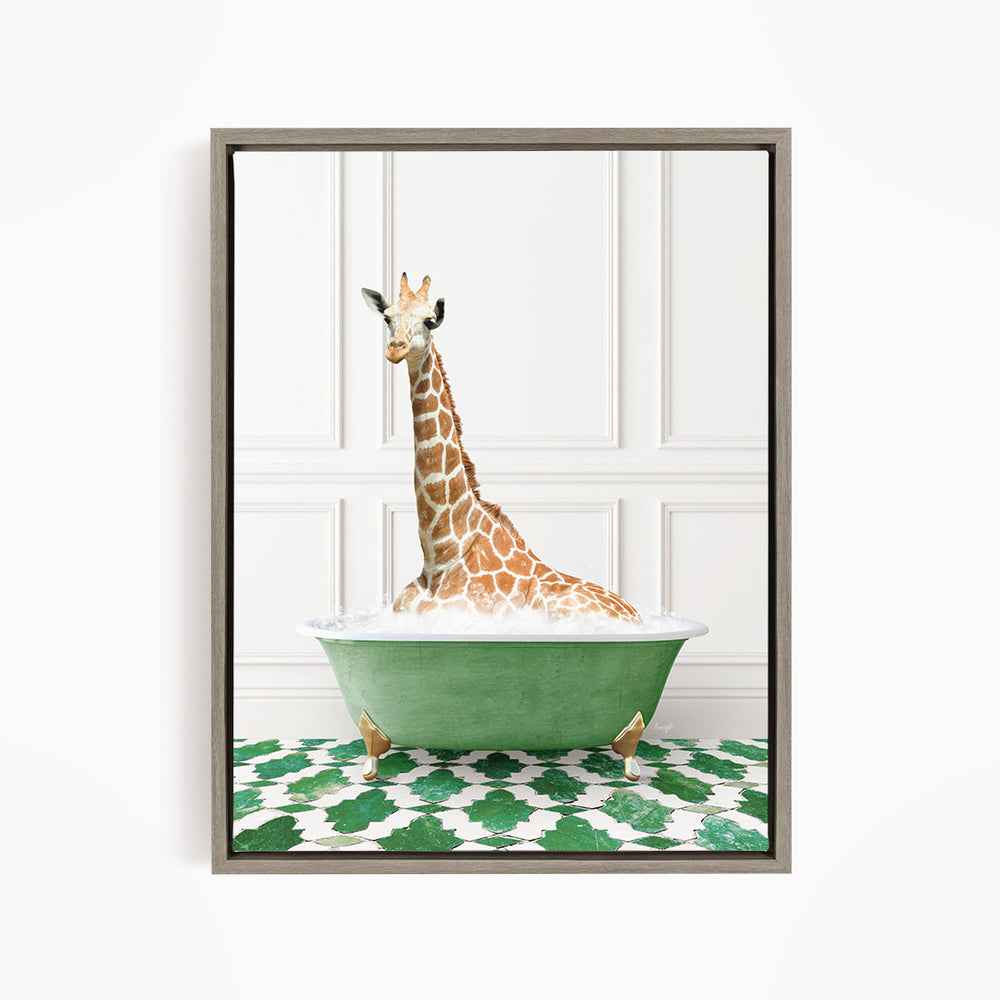 A giraffe sitting in a green bathtub filled with bubbles, surrounded by a green and white patterned floor.