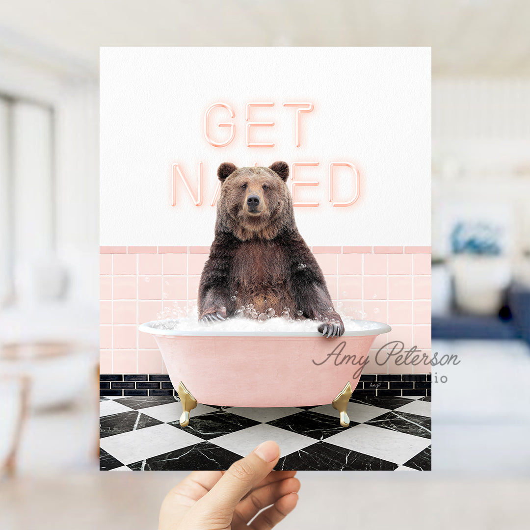 a person holding up a card with a picture of a bear in a bathtub