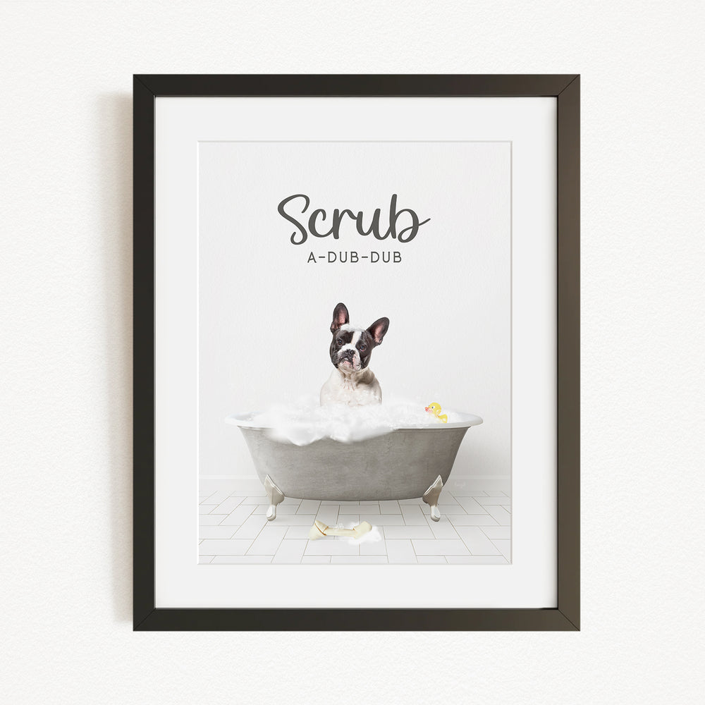 A dog sitting in a bathtub filled with bubbles, with a rubber duck floating nearby.