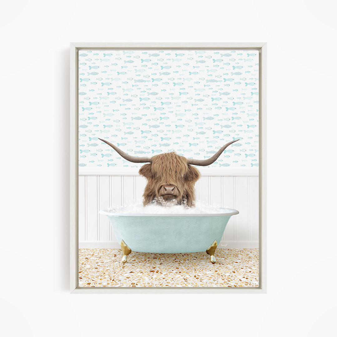 A brown cow with long horns is sitting in a light blue bathtub filled with water, surrounded by a pattern of small fish.